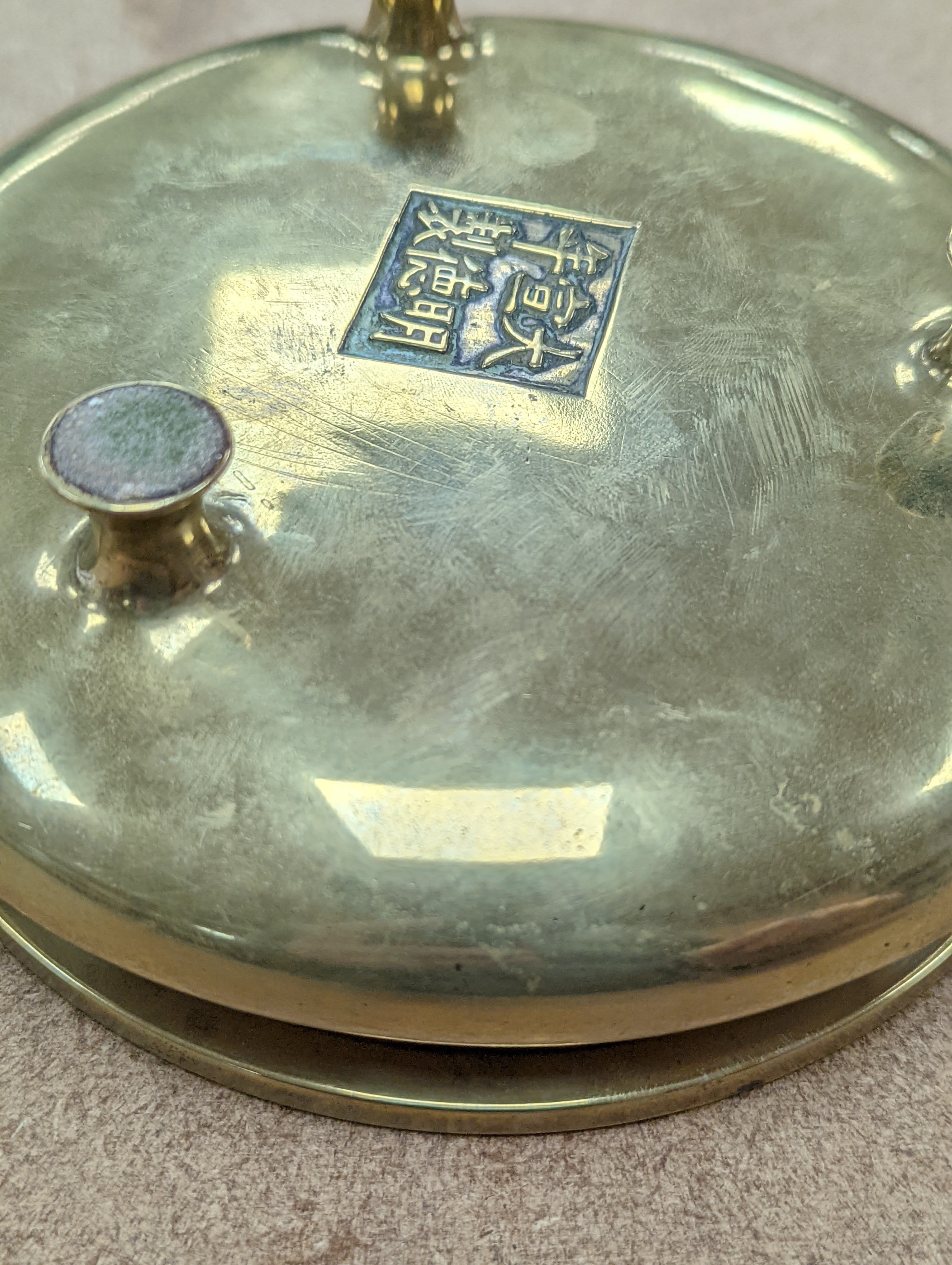 A Chinese bronze censer, ding, Xuande mark, 18th / 19th century, diameter 16.6cm, height 6.7cm